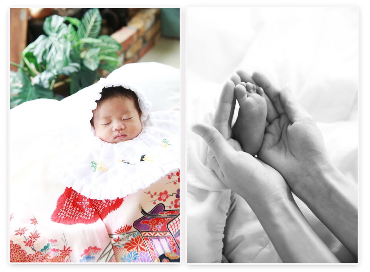 お宮参りの赤ちゃん 祝い着をまとった新生児と家族の手